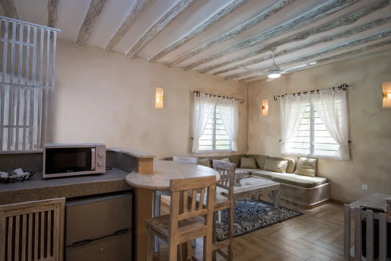 The living room and kitchen of a two-bedroom apartment